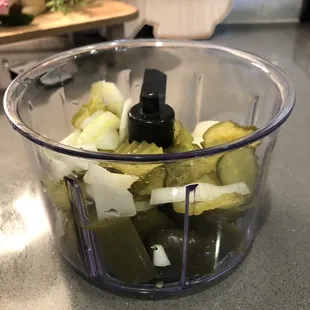 Picked up some jalapeños, onions, and pickles from the self serve counter. Making a relish.