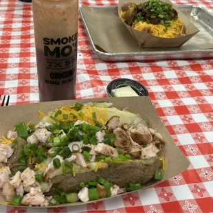 Smokey Mo&apos;s turkey and fixins on a baked potato and chopped on a baked potato.