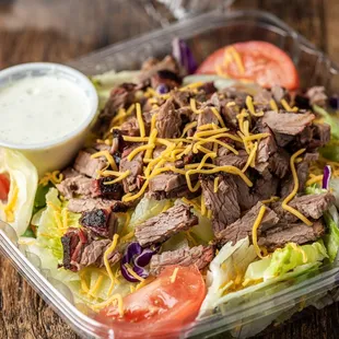 beef, lettuce, tomato, and cheese