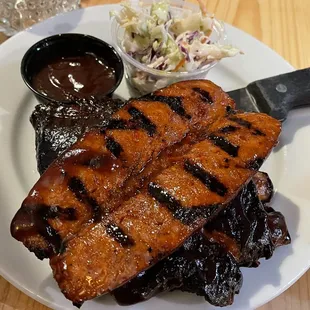 Smoked Meats - that&apos;s a split open smoked hot link on top of ribs on top of pulled pork.