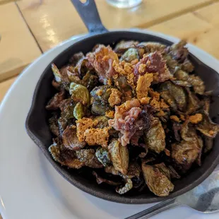 Crispy brussel sprouts with bacon and pomegranate drizzle