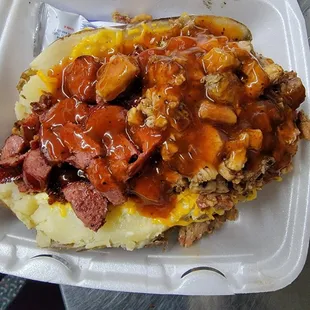 Pulled pork and sausage baked potato