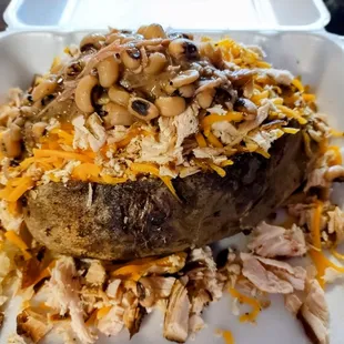 Smoked chicken baked potato plus black eyed peas! Delicious!