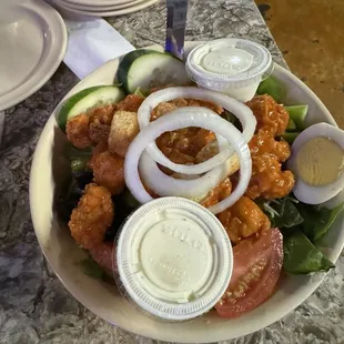 Crispy Chicken salad with hot buffalo chicken.
