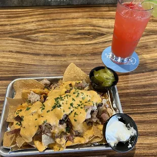 Loaded nachos with pulled pork &amp; spiked cherry limeade cocktail