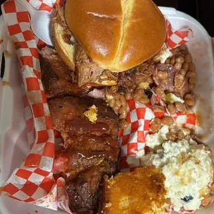 Pulled pork sandwich and rib plate