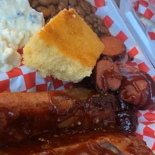 Cornbread, potato salad, beans, and the meats.. 10/10