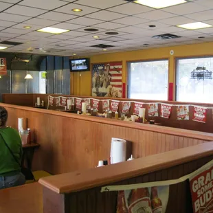 spacious dining area with two people sitting
