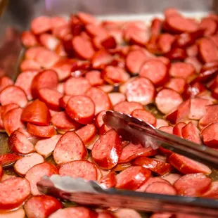 sausage being cooked