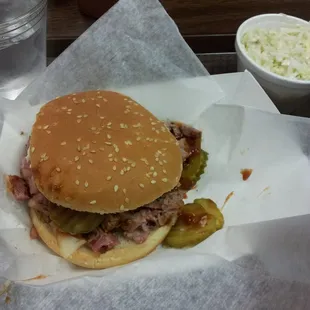 Chopped brisket sandwich with a side of coleslaw