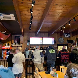 Place filled up with customers in the 20m we&apos;ve been here! View of the bar and ordering counter