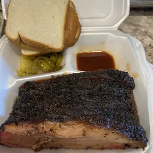 Juicy tender brisket, white bread, pickles &amp; jalapenos