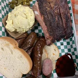 Sausages were so fresh and juicy, ribs had so much flavor and the potato salad was really good..