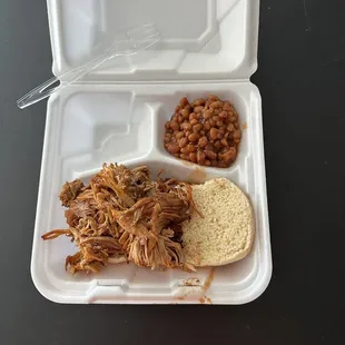 pulled pork and beans in a styrofoam container