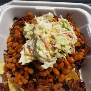 Redneck Nacho
Your choice of chips, meat and side for the topper