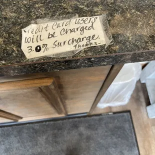  a person standing in front of a laptop