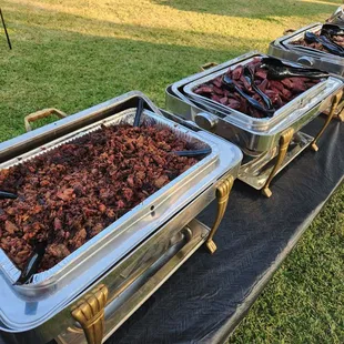 ws a variety of food being served at a party
