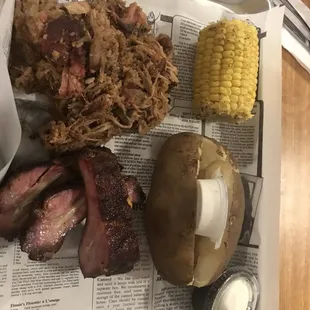 Corn on cob baked potato ribs pulled pork