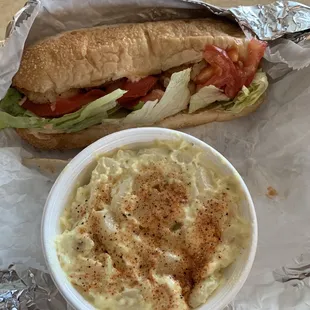 Shrimp po boy and potato salad