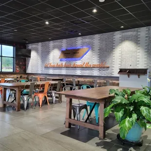 a restaurant with tables and chairs