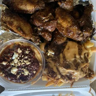 10 Wings and 2 Sides; Jamaican jerk seasoning zesty fries and chipotle hummus