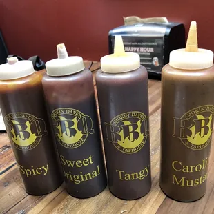 hree bottles of barbecue sauce