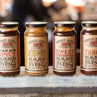 hree jars of barbecue sauce