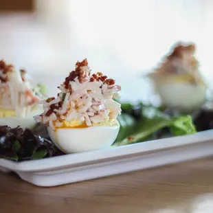 a plate of deviled eggs