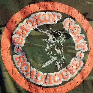a camo jacket with a logo on it