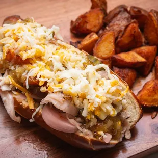  hot dog with sauerkraut and potatoes