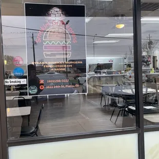 The window has this sign in it