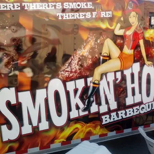  woman on the side of a truck