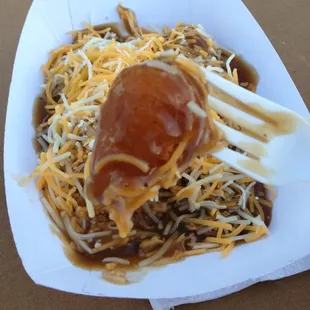 Fried mashed potatoes with gravy n cheese