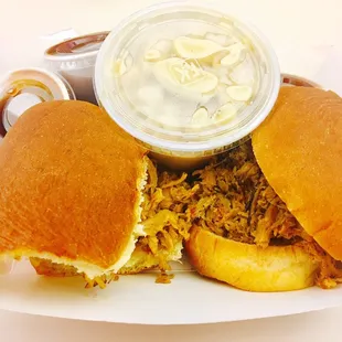 Pulled pork sliders with mac and cheese. Yum!!!