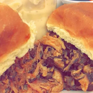 Pulled pork slider (left), chicken slider (right), Mac and cheese (in the back)