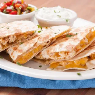 a plate of quesadillas