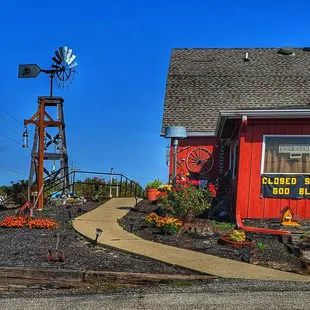 a red building with a windmill