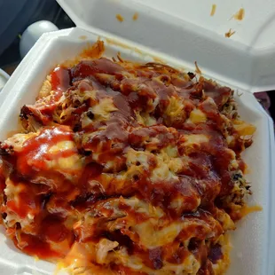 a close up of a takeout container of food