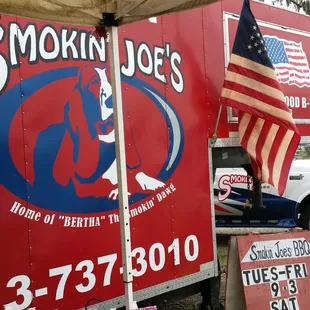 a truck with a flag on it