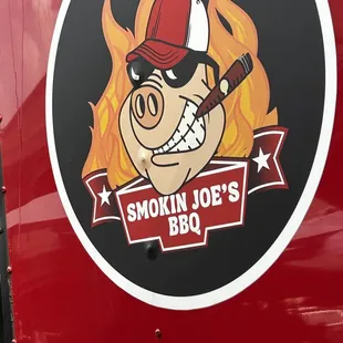 the logo on the side of the truck