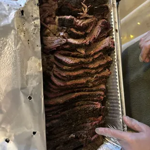a tray of brisked beef