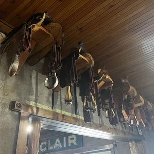 Saddles on the wall