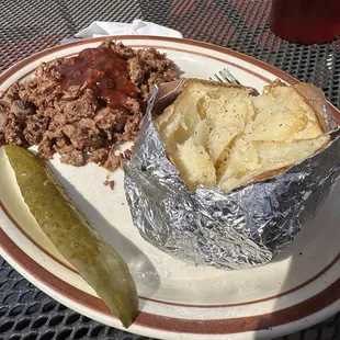 Baked potato with chopped brisket.