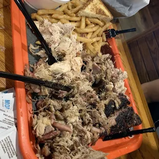 Pulled pork and chicken and bread and coke slaw