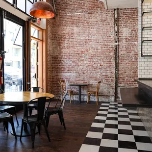 a dining room with a checkered floor