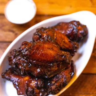 a plate of chicken wings