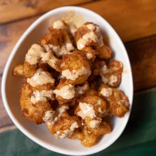 a bowl of fried tater tots