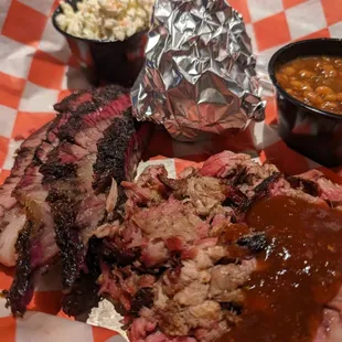 Chopped pork, brisket, Cole slaw, baked beans, corn bread muffin.