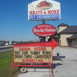 a sign for smokin&apos;s and more