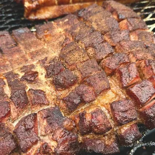 a piece of meat on a grill